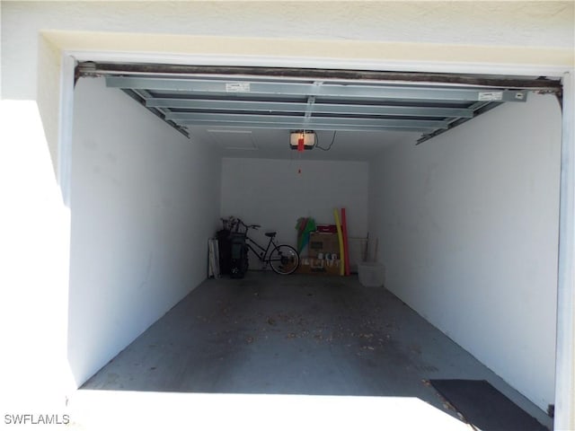 garage featuring a garage door opener