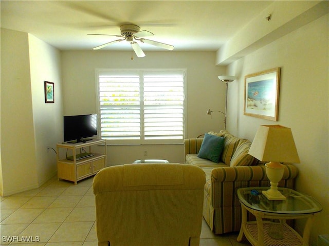 living room with light tile patterned floors and ceiling fan