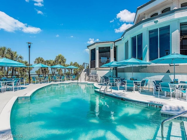 pool with a patio area