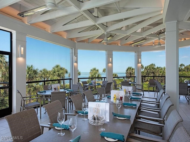 view of patio featuring ceiling fan and outdoor dining space