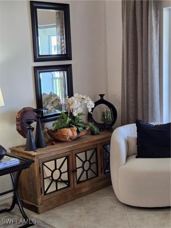 living area featuring light tile patterned floors