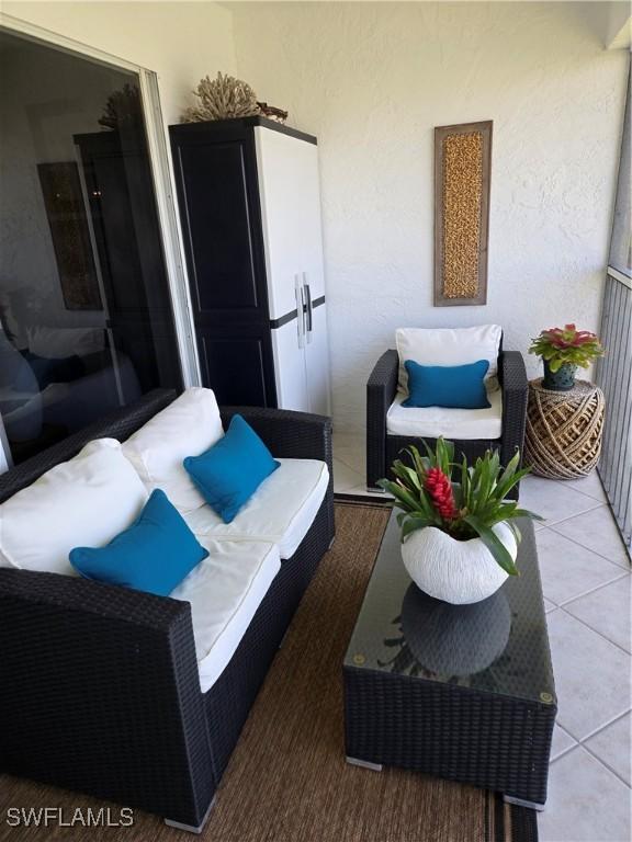 balcony with an outdoor hangout area