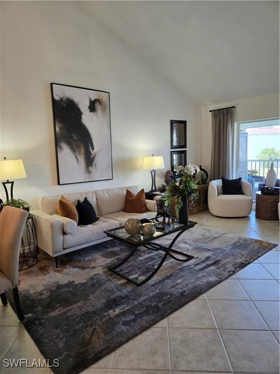 tiled living room with high vaulted ceiling