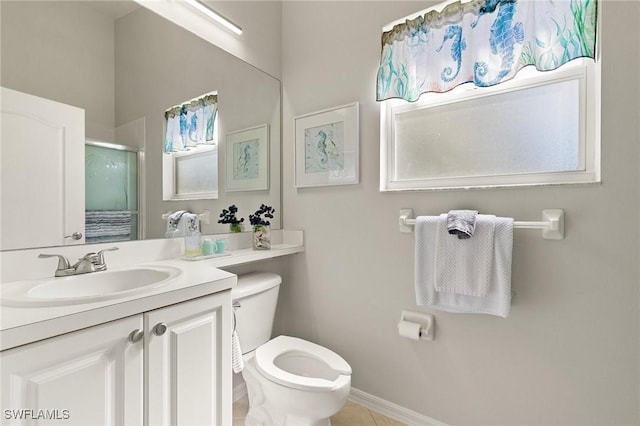 bathroom with an enclosed shower, baseboards, toilet, and vanity