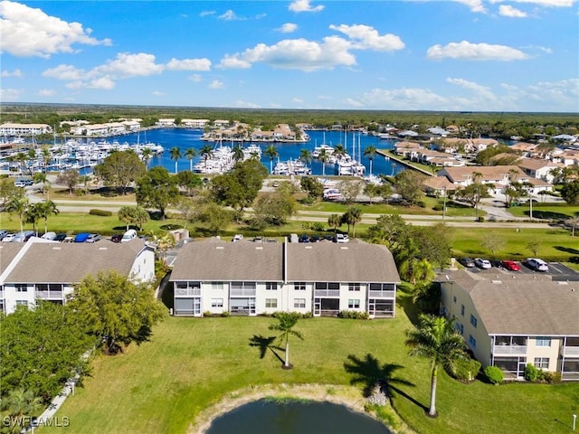 bird's eye view with a water view