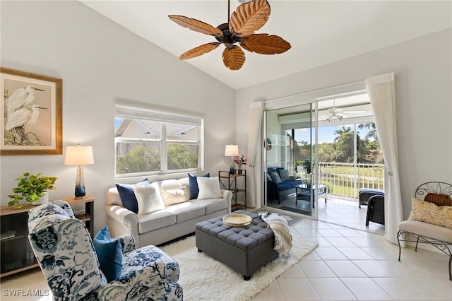 living room featuring light tile patterned flooring, ceiling fan, and lofted ceiling