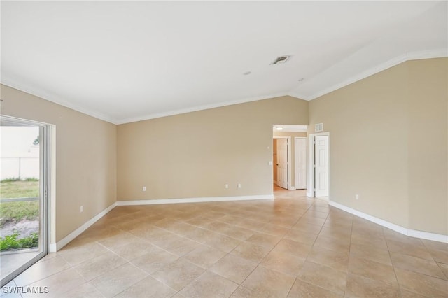 unfurnished room with visible vents, ornamental molding, light tile patterned floors, baseboards, and vaulted ceiling