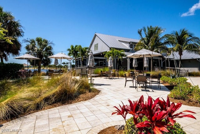 view of home's community with a patio