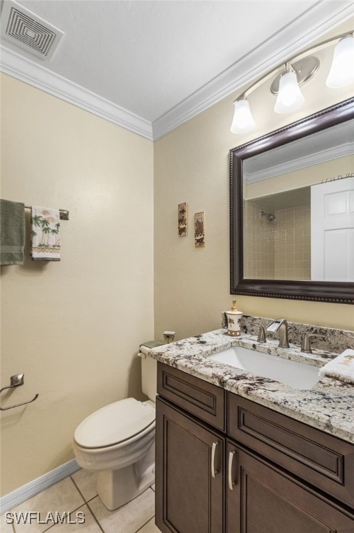 bathroom with vanity, visible vents, ornamental molding, tile patterned flooring, and toilet