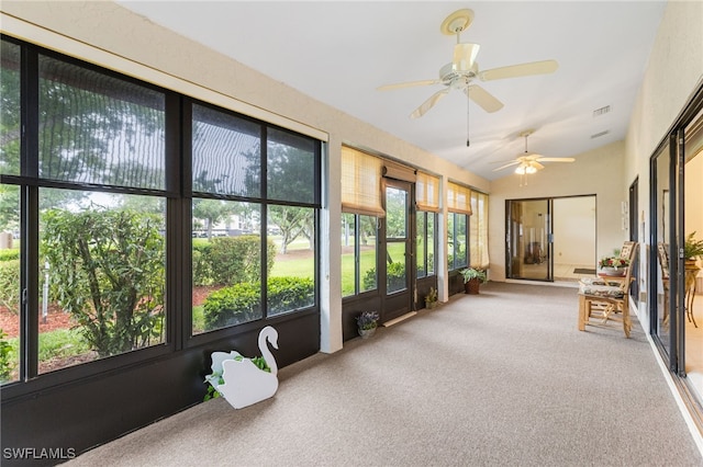 unfurnished sunroom with visible vents