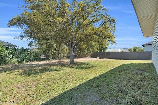 view of yard with fence