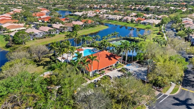 aerial view with a residential view and a water view