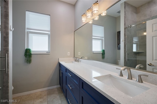 3381 Mystic River Dr, Naples, FL 34120 - full bathroom with tile patterned floors, toilet, a stall shower, and a sink