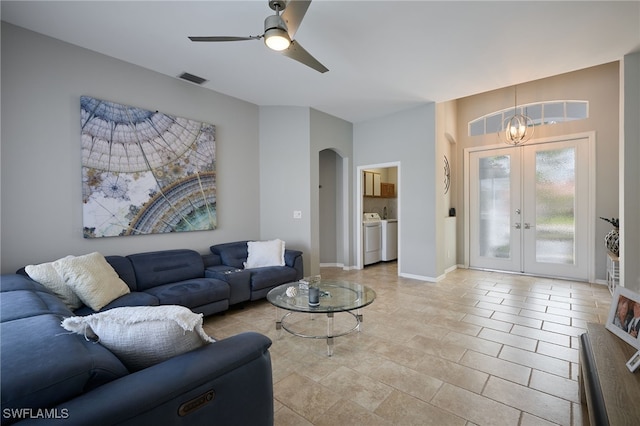3381 Mystic River Dr, Naples, FL 34120 - tiled living area featuring a ceiling fan, visible vents, arched walkways, french doors, and washer and dryer