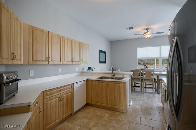 3381 Mystic River Dr, Naples, FL 34120 - kitchen featuring visible vents, white dishwasher, freestanding refrigerator, ceiling fan, and a sink