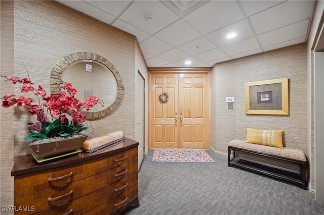 foyer with recessed lighting and a drop ceiling