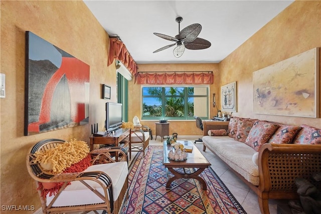 living room featuring tile patterned floors and ceiling fan