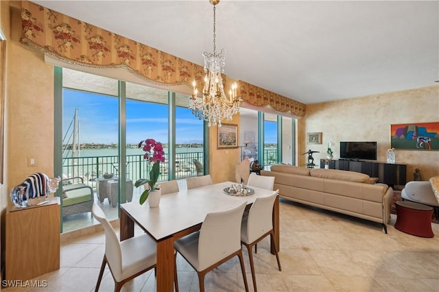 dining space with a chandelier