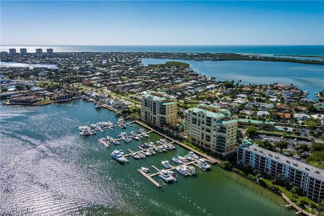 bird's eye view with a view of city and a water view