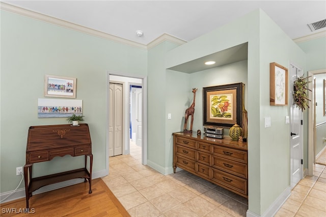 12922 Kedleston Cir, Fort Myers, FL 33912 - entrance foyer featuring light tile patterned floors, ornamental molding, and baseboards