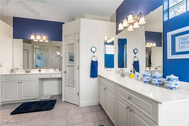 12922 Kedleston Cir, Fort Myers, FL 33912 - bathroom featuring healthy amount of natural light, ceiling fan, tile patterned floors, and two vanities