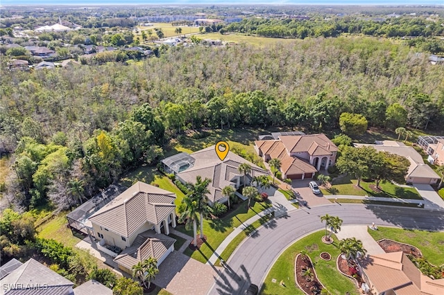 12922 Kedleston Cir, Fort Myers, FL 33912 - aerial perspective of suburban area featuring a forest
