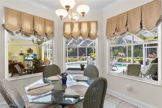 12922 Kedleston Cir, Fort Myers, FL 33912 - dining room with a chandelier, light tile patterned floors, plenty of natural light, and ornamental molding