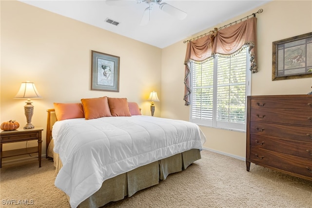 12922 Kedleston Cir, Fort Myers, FL 33912 - bedroom with light colored carpet, baseboards, and a ceiling fan