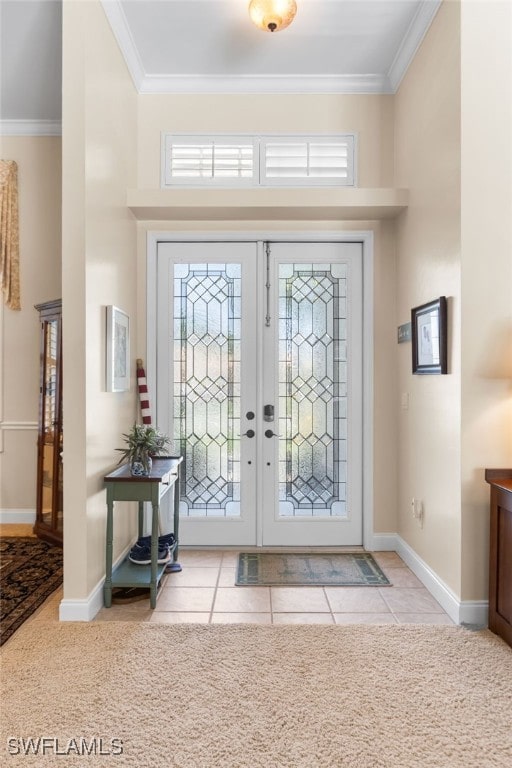 12922 Kedleston Cir, Fort Myers, FL 33912 - entrance foyer with crown molding, baseboards, french doors, and tile patterned floors