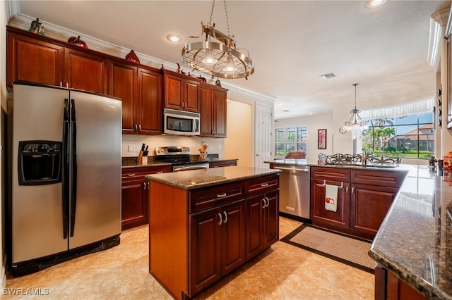 kitchen with visible vents, crown molding, pendant lighting, recessed lighting, and stainless steel appliances