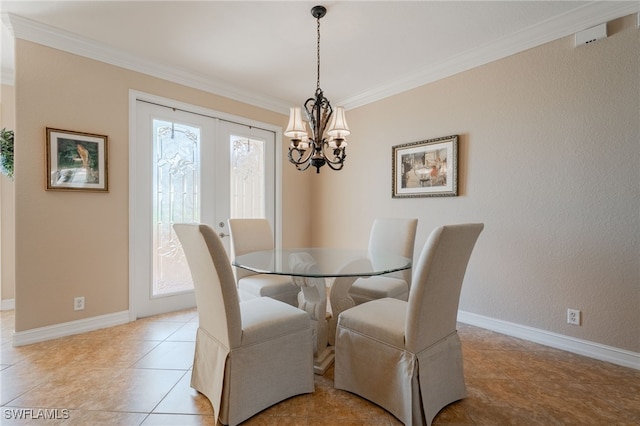 dining space featuring a notable chandelier, baseboards, and ornamental molding