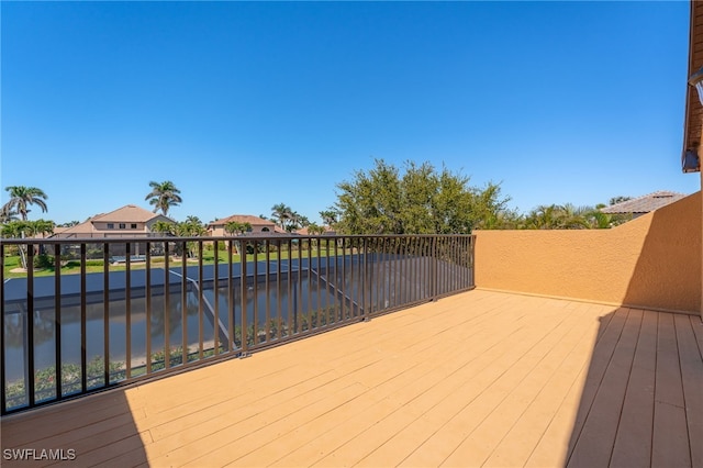 deck featuring a water view