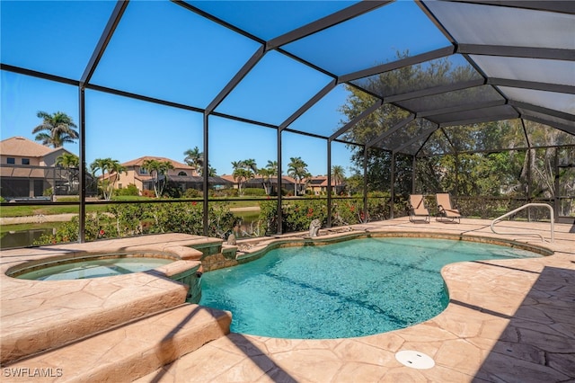 5220 SW 22nd Ave, Cape Coral, FL 33914 - view of swimming pool with a patio, a residential view, glass enclosure, and a pool with connected hot tub