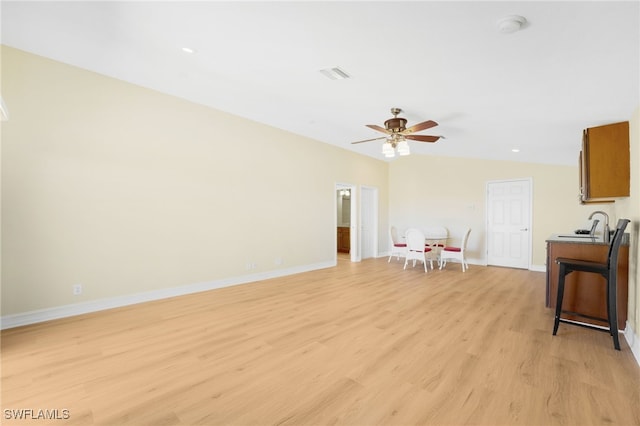 5220 SW 22nd Ave, Cape Coral, FL 33914 - living area with light wood finished floors and a ceiling fan