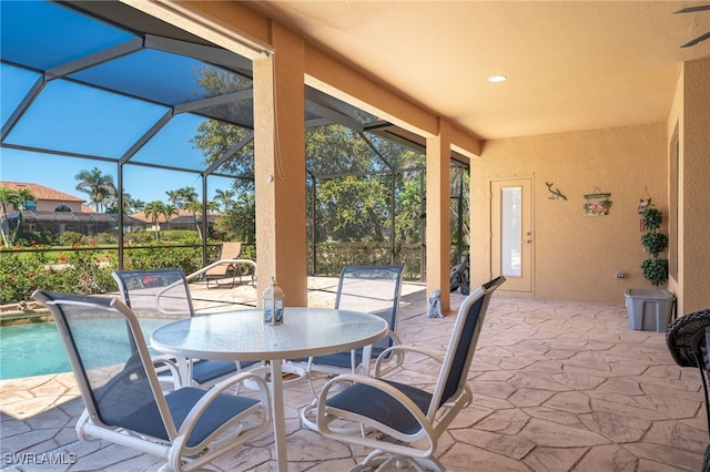 5220 SW 22nd Ave, Cape Coral, FL 33914 - view of patio / terrace featuring a lanai, an outdoor pool, and outdoor dining area