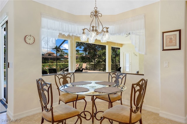 5220 SW 22nd Ave, Cape Coral, FL 33914 - dining room with a chandelier and baseboards