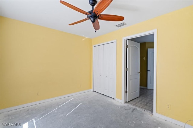 unfurnished bedroom featuring visible vents, baseboards, a closet, and a ceiling fan