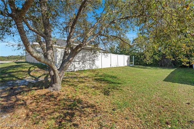 view of yard featuring fence