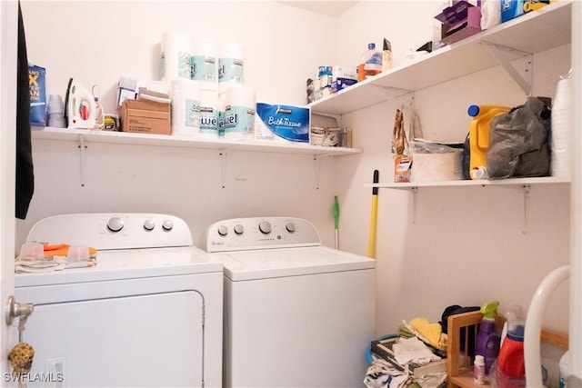 laundry area featuring laundry area and washing machine and clothes dryer