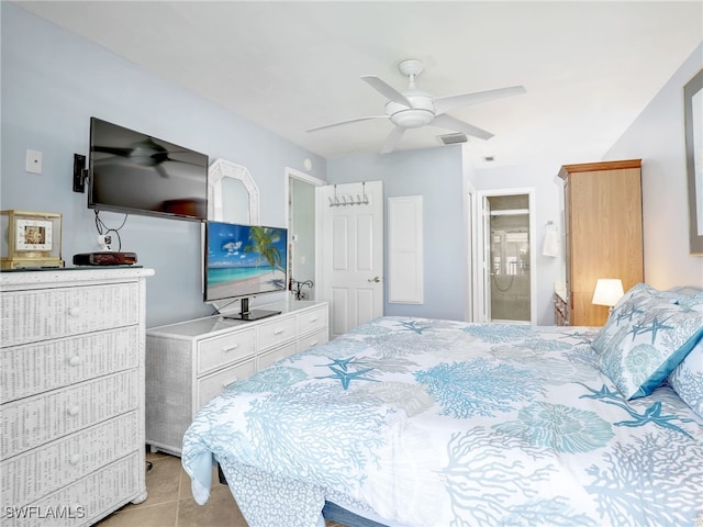 bedroom featuring light tile patterned floors, a ceiling fan, and visible vents