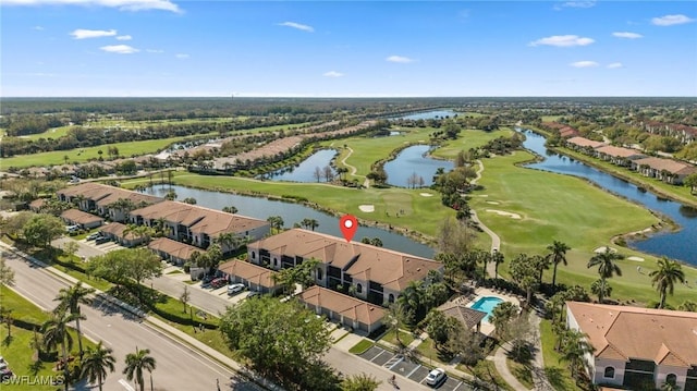 bird's eye view with a residential view, a water view, and view of golf course