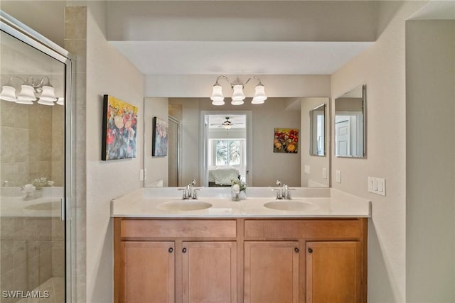 ensuite bathroom featuring ensuite bath, a stall shower, and a sink