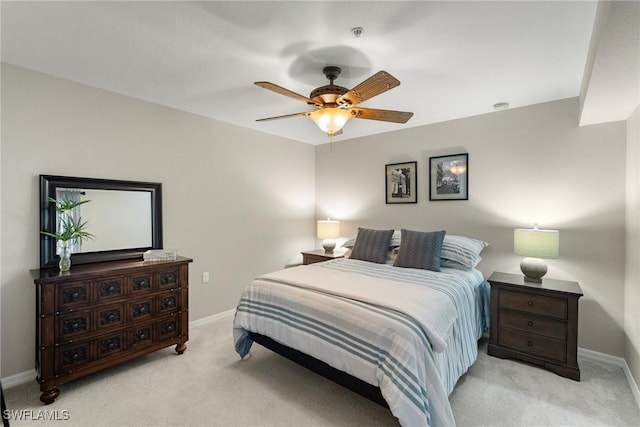 bedroom featuring carpet, baseboards, and ceiling fan