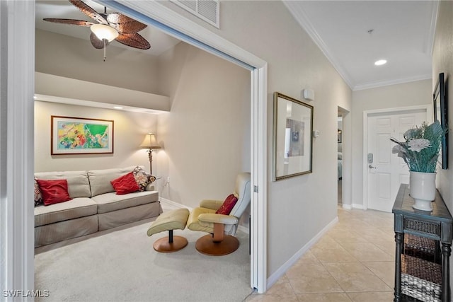 interior space with baseboards, light tile patterned flooring, recessed lighting, ceiling fan, and crown molding