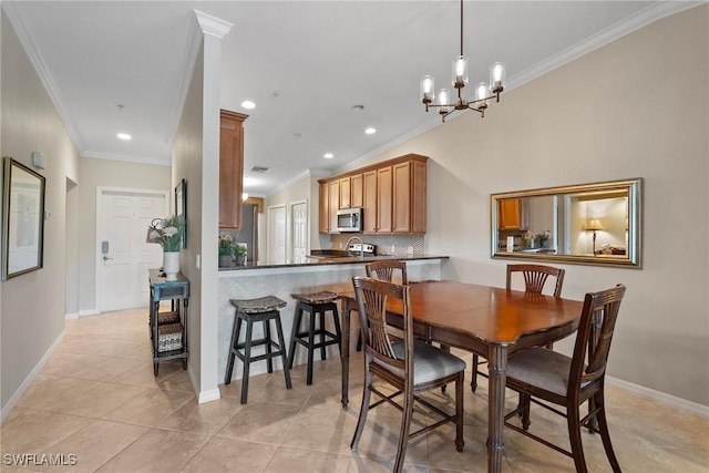 dining room featuring crown molding, baseboards, vaulted ceiling, light tile patterned floors, and a notable chandelier