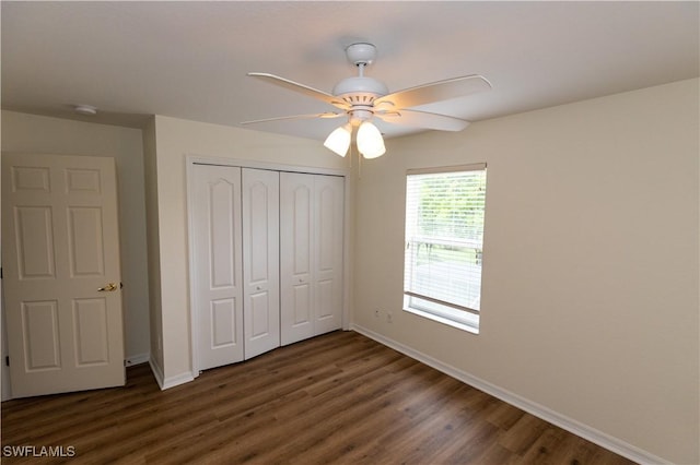 12391 Muddy Creek Ln, Fort Myers, FL 33913 - unfurnished bedroom with baseboards, dark wood-style floors, a closet, and ceiling fan