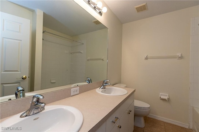 12391 Muddy Creek Ln, Fort Myers, FL 33913 - full bath with toilet, tile patterned floors, double vanity, baseboards, and washtub / shower combination