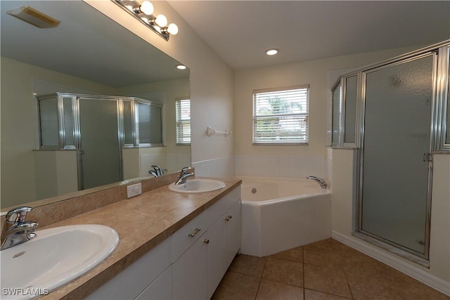 12391 Muddy Creek Ln, Fort Myers, FL 33913 - bathroom with a shower stall, a bath, double vanity, tile patterned floors, and recessed lighting