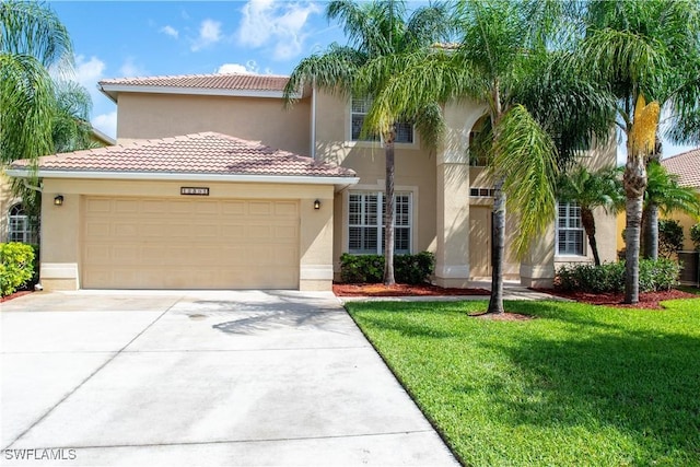 12391 Muddy Creek Ln, Fort Myers, FL 33913 - mediterranean / spanish-style house with driveway, a front lawn, stucco siding, an attached garage, and a tile roof