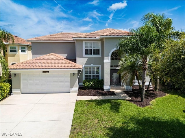 12391 Muddy Creek Ln, Fort Myers, FL 33913 - view of front of house featuring stucco siding, a tiled roof, a garage, a front lawn, and concrete driveway
